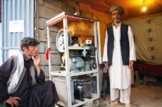 Afghanistan: Ice cream vendor in Chatta, Northern Afghanistan. The electricity he uses is supplied by a micro-hydro project supported by GIZ. <br />
© GIZ / Oliver J. Haas